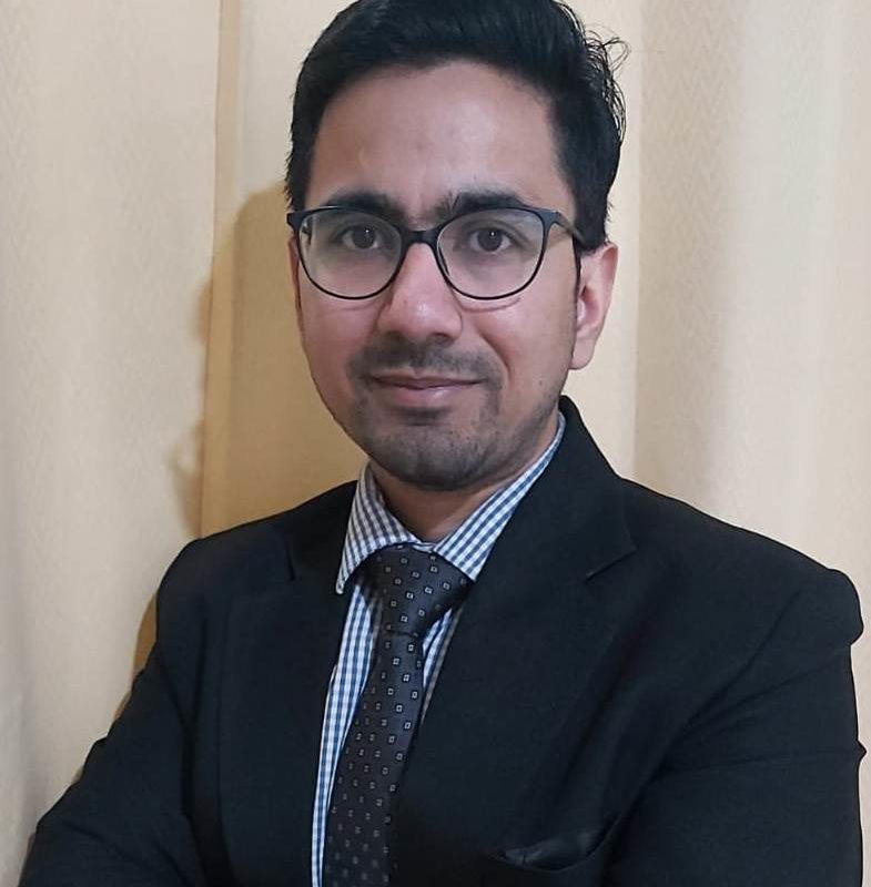 Dr. Tarun Dusad
